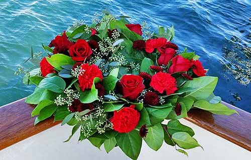 Wreath red rose for sea burial