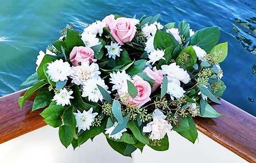 Wreath white pink flowers for sea burial